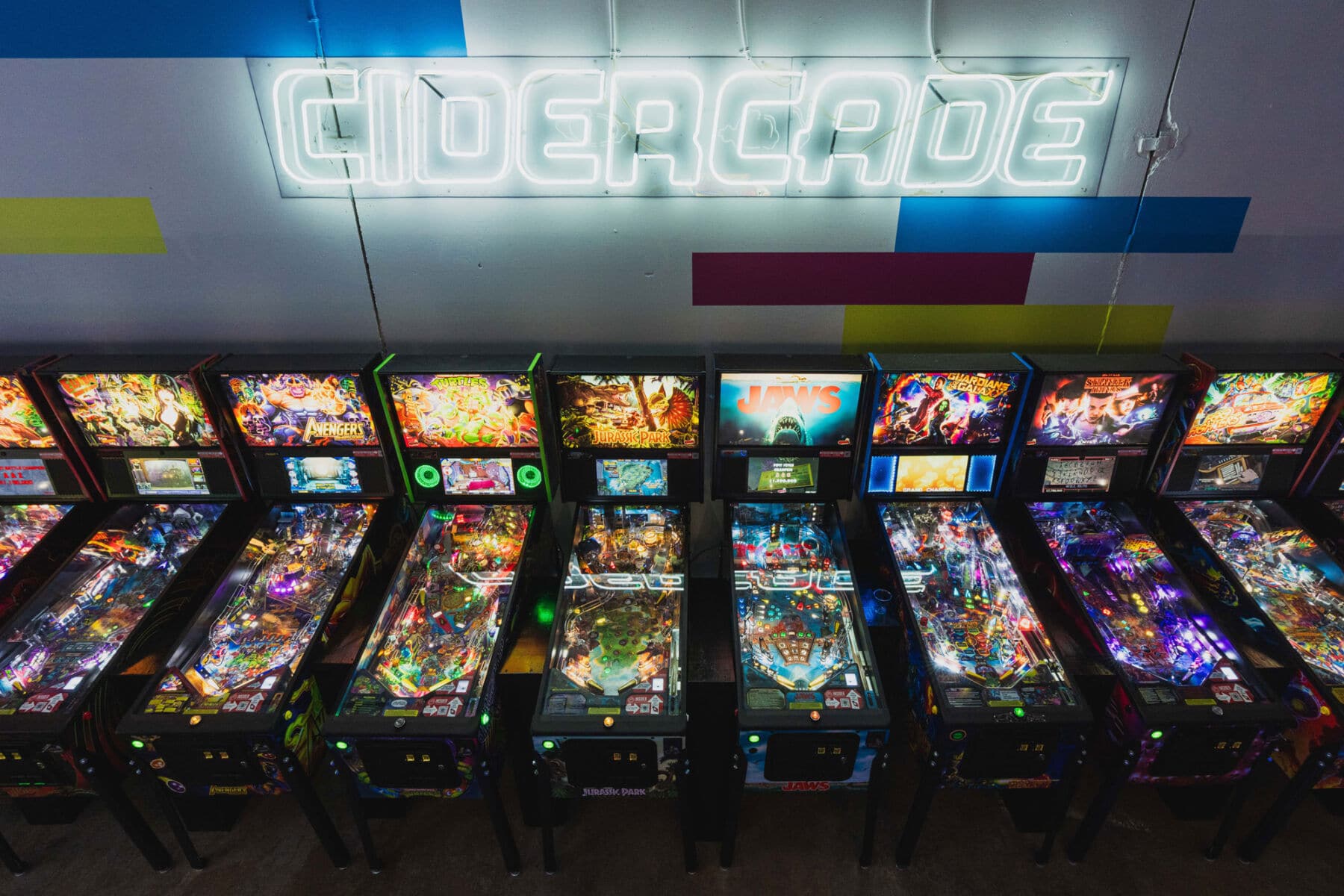 row of pinball machines