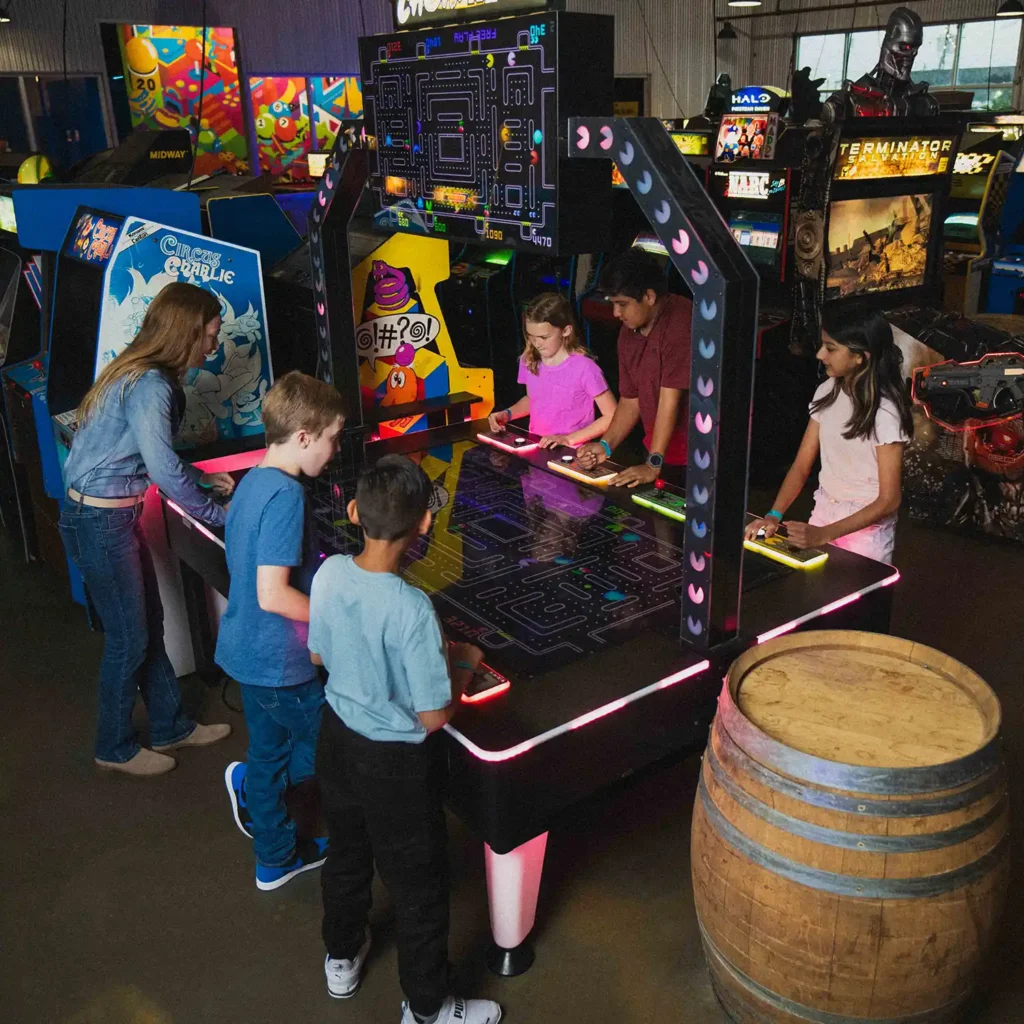 kids playing arcade games